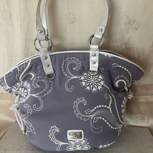 Women’s BEJIO London Paris Reversible bag. Patent leather with silver accents.